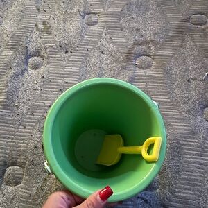 Green Bucket with Yellow Shovel